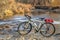 Touring bike and a river in fall scenery