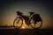 Touring bikes parked by the sea at Ban Na Kluea Bay during sunset in Pattaya, Naklua