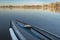 Touring stand up paddleboard on a lake