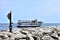 A tourism boat cruises the Lake Michigan shoreline