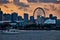 Tourism location of Navy Pier in Chicago along Lake Michigan, with tour boat passing in foreground.