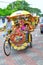 Tourism Malaysia - trishaw and passenger