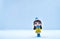 Tourism and travel concept: Miniature little girl standing in isolated background