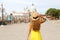 Tourism in Venice, Italy. Young traveler girl on summer holidays in Europe. Female back view with Venice landscape on the