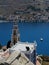 Tourism - View of the bay of mediterranian island. View of church.