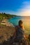 Tourist admires Tegal Wangi Beach Badung Bali Indonesia