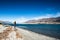 Tourist admires the view while stand next to Lake wanaka Boundary Cree