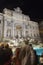 Tourist admiring the Trevi Fountain from Rome