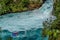 Tourist adventure in Huka Falls with Huka jet boat the most famous iconic thriller activity in Taupo, New Zealand