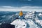 Tourist alone standing and meditating over snow covered Atlas mountain range