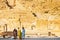 Tourist by ancient ruins with blue sky background. Persepolis, Iran. Ancient Persian city. Persepolis popular tourist destination