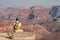 Tourist with backpack at Grand Canyon