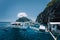 Tourist banca boats on blue sea water surface on island hopping tour. El Nido, Palawan, Philippines