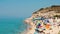 Tourist / Bathers / People on colorful beach - blurred persons - slow motion