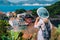 Tourist blond women with sun hat in cute colorful small Assos village. Kefalonia, Greece