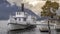 Tourist boat anchored on pier