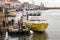 Tourist boat at dock awaitng passengers