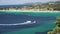 A tourist boat on the horizon in the beautiful Caribbean ocean