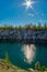 Tourist boat in Marble Canyon under the sun