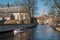 Tourist boat next to the Beguinage in the city of Bruges