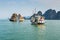 Tourist Boat Visiting the Kissing Rocks in Halong Bay, Vietnam