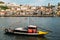 Tourist boats on the Douro River at the famous UNESCO World Heritage Site of Cais Ribeira overlooking Vila Nova de Gaia