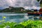 Tourist boats in the foreground, Bled Island is in the background; Lake Bled, Slovenia.