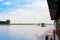 Tourist boats on the Irrawaddy river, Mandalay, Myanmar, Burma. Copy space for text.