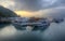 Tourist boats moored to the docks during partial solar eclipse at Shuishe Pier of Sun-Moon Lake in Nantou