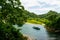 Tourist boats, the mouth of Phong Nha cave with underground river, Phong Nha-Ke Bang National Park, Vietnam