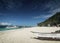 tourist boats on puka beach in tropical boracay island philippines