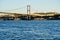 Tourist boats sail under the bridge in Istanbul. Traveling on the Bosphorus. Panoramic view, View of the First Bosphorus