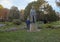 Tourist by Bronze statue Emperor Francis Joseph I of Austria, Burggarten Park, Vienna