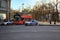 Tourist bus and police car on a background of the Alexander Garden