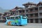 Tourist buses and modern antique buildings