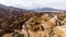 Tourist Buses in Rainbow Mountains Zhangye Danxia Landform Geological Park in China and Road