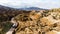 Tourist Buses in Rainbow Mountains Zhangye Danxia Landform Geological Park in China and Road