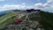 Tourist business and cable car traffic in mountains in sunny day time lapse