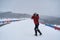 Tourist with camera in the blizzard