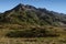 Tourist Camp Next to Mountain Lake and Reflections in Water