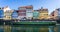 Tourist canal boat in the Canal at historic Nyhavn district in Copenhagen, Denmark