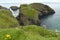 Tourist on the Carrick-a-Rede rope bridge on the Causeway Coast in Antrim County, N