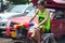 Tourist celebrating Songkran with bike
