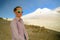 Tourist climber on the background of Mount Kazbek. Portrait of a woman in mountain sunglasses