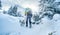 Tourist climbing snowy mountain in winter