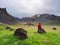 Tourist contemplating the beauty of summer Iceland