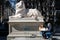 Tourist couple having breakfast on the steps of the New York Public Library