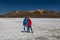 Tourist couple on the Laguna de Salinas 62 km east of Arequipa at an altitude of 4300 meters