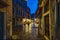 Tourist couple on the night streets of Venice