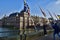 Tourist couple taking pictures in front of The Hague`s Binnenhof